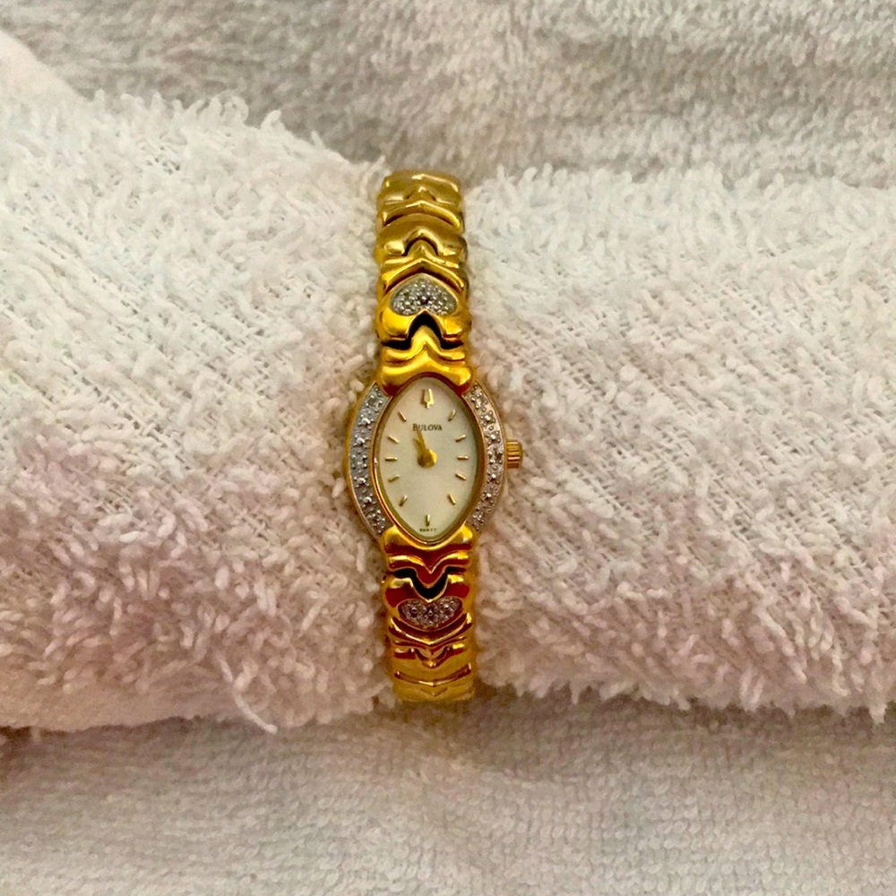 Bulova Gold tone diamond link watch